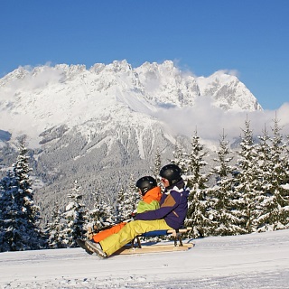 Divertimento con lo slittino nello SkiWelt di Ellmau e Söll